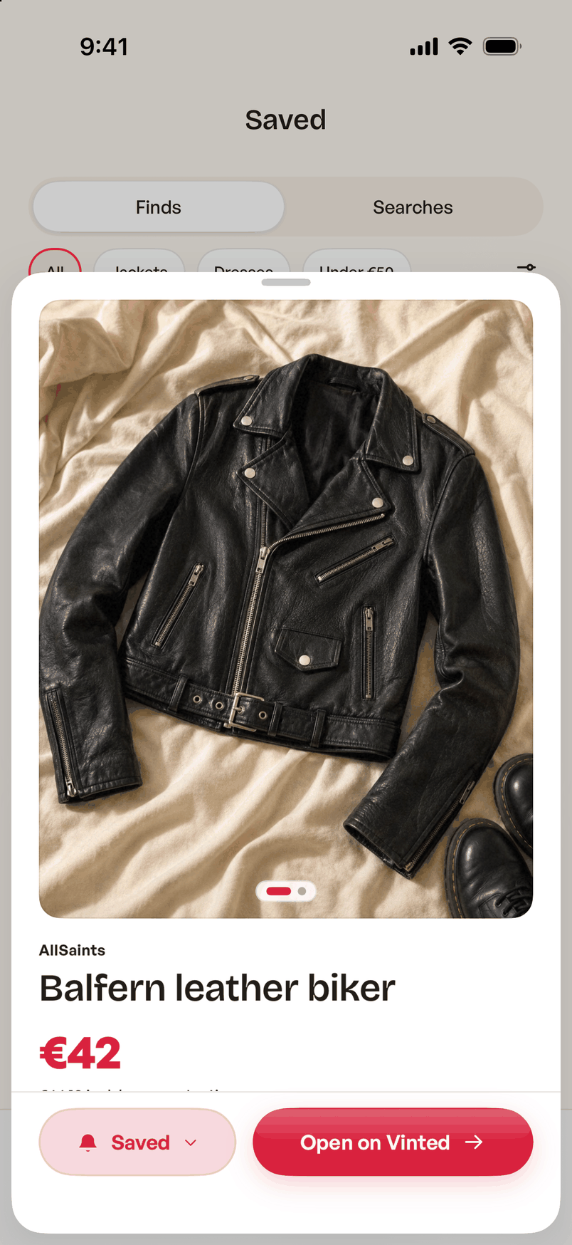 A listing opened in the app with photos, size and condition, and a button to open it on Vinted